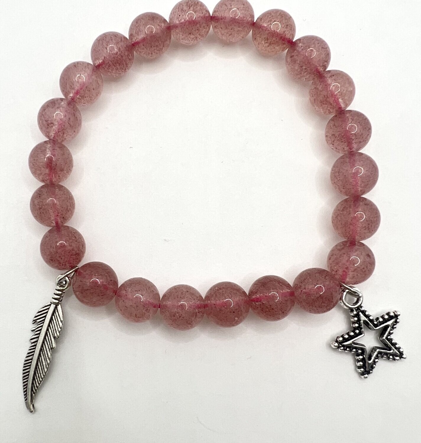brown crystal bracelet with trinkets
