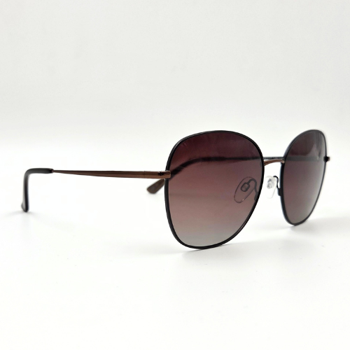 Sonnenbrille mit dünnem Metallrahmen in Kupfer und braunen Verlaufsgläsern – schräge Seitenansicht