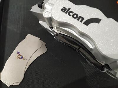 Titanium brake pad shims for Alcon CAR 97 calipers