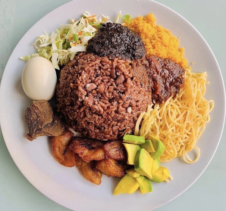Bellyful Waakye with Avocado, Fried Plantain and Egg.