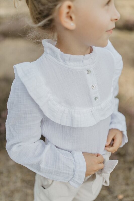 Bluse mit Rüschen und Knopfleiste Bluse mit Rüschen und Knopfleiste