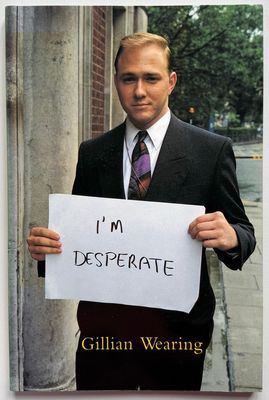 [SIGNED] GILLIAN WEARING SIGNS THAT SAY