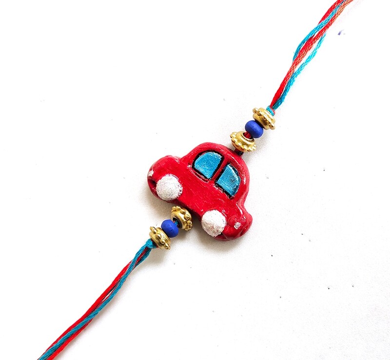 Tulasi Seed Rakhi - Red Car
