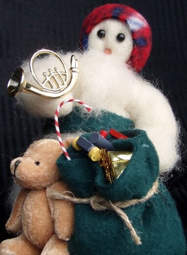 Packing Up Wooly Primitive Snowman as Santa Claus