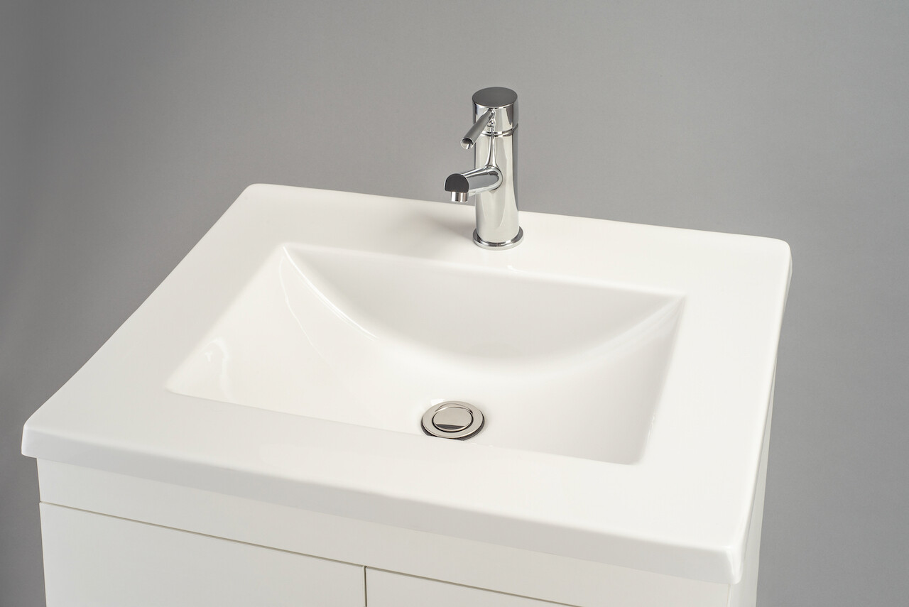 OASIS-600 Wall Mounted Cabinet &amp; Basin with silver handles.