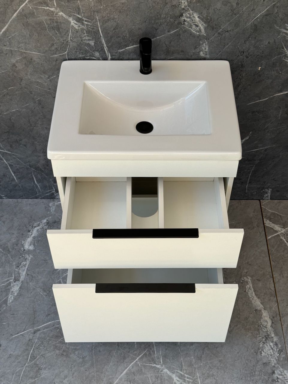 TAO-600 Floor Standing Cabinet &amp; Basin with black handles and legs.