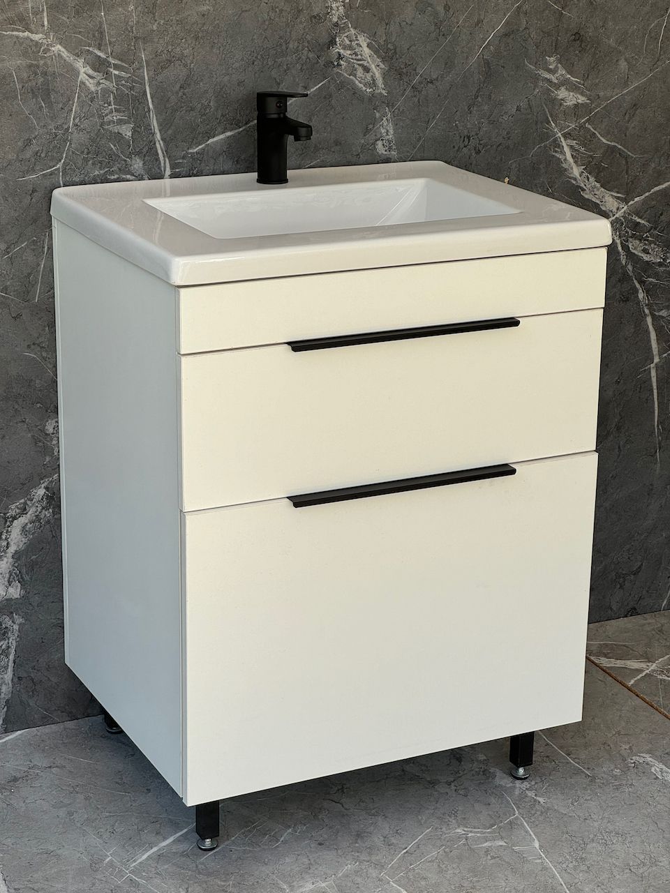 TAO-600 Floor Standing Cabinet &amp; Basin with black handles and legs.