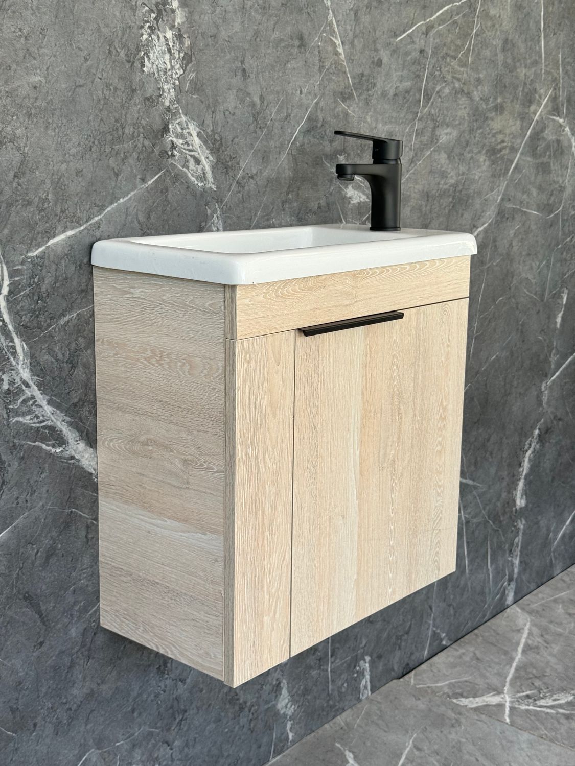 ELIN-500 Wall Mounted Cabinet &amp; Basin with black handle.