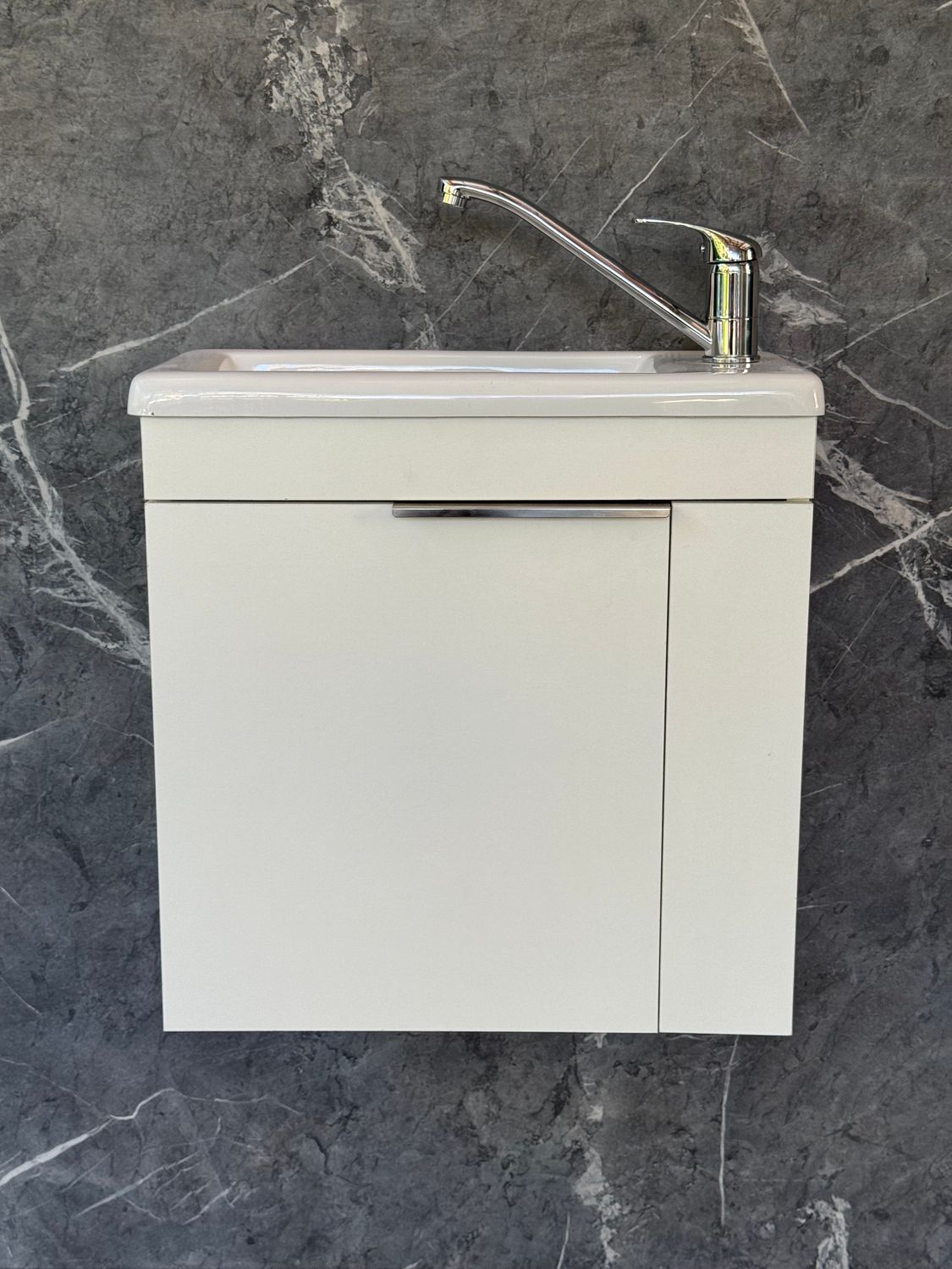 ELIN-500 Wall Mounted Cabinet &amp; Basin with silver handle.