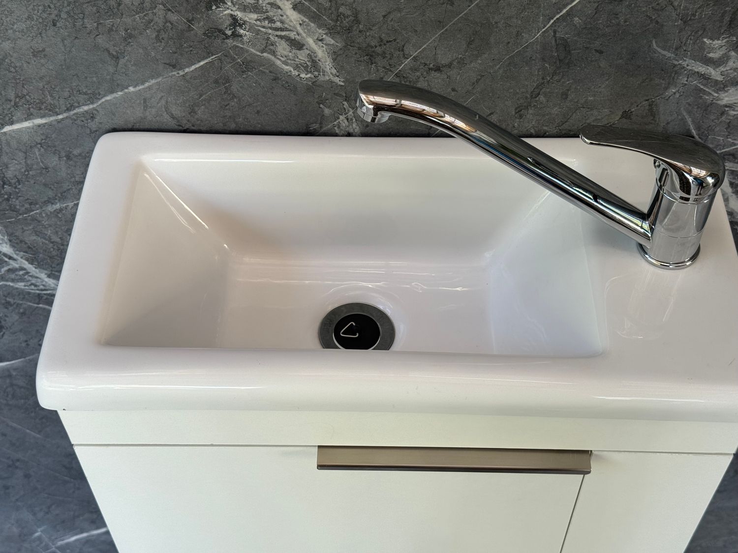 ELIN-500 Wall Mounted Cabinet &amp; Basin with silver handle.