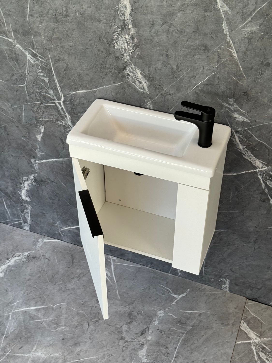 ELIN-500 Wall Mounted Cabinet &amp; Basin with black handle.