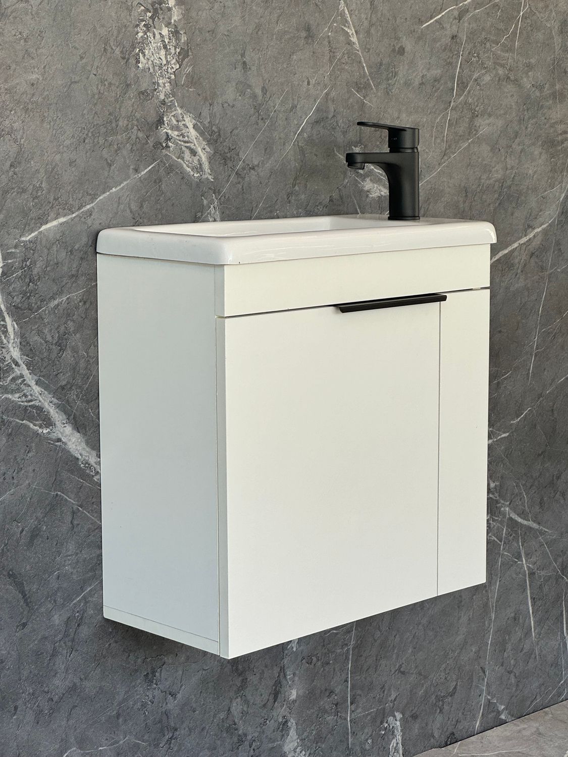 ELIN-500 Wall Mounted Cabinet &amp; Basin with black handle.