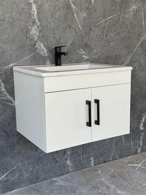 OASIS-600 Wall Mounted Cabinet &amp; Basin with black handles.