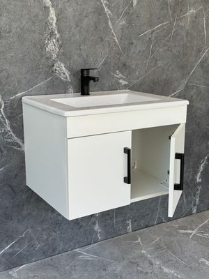 OASIS-600 Wall Mounted Cabinet &amp; Basin with black handles.