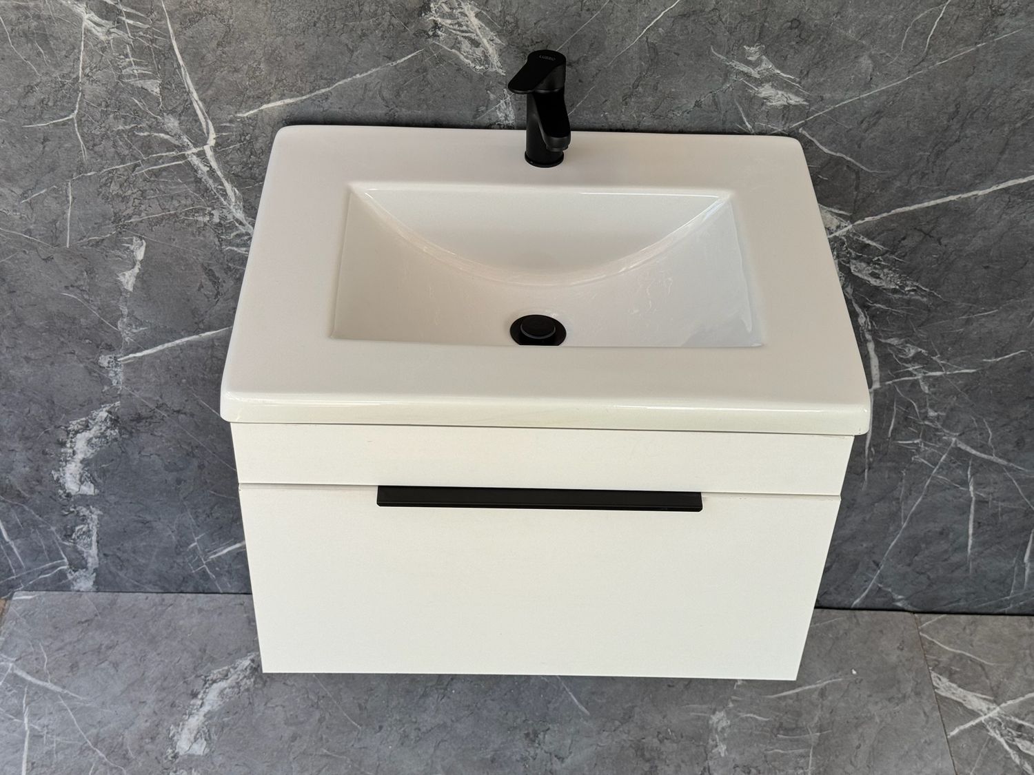 KUDO-600 Wall Mounted Cabinet &amp; Basin with black handle.