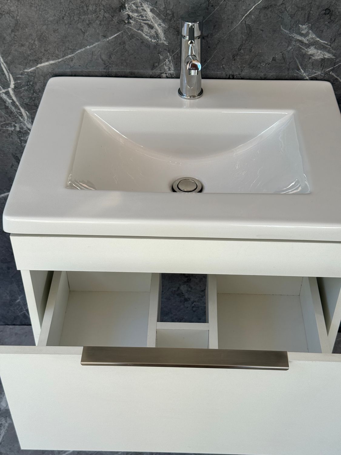 KUDO-600 Wall Mounted Cabinet &amp; Basin with silver handle.