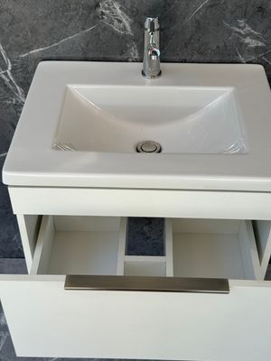 KUDO-600 Wall Mounted Cabinet &amp; Basin with silver handle.