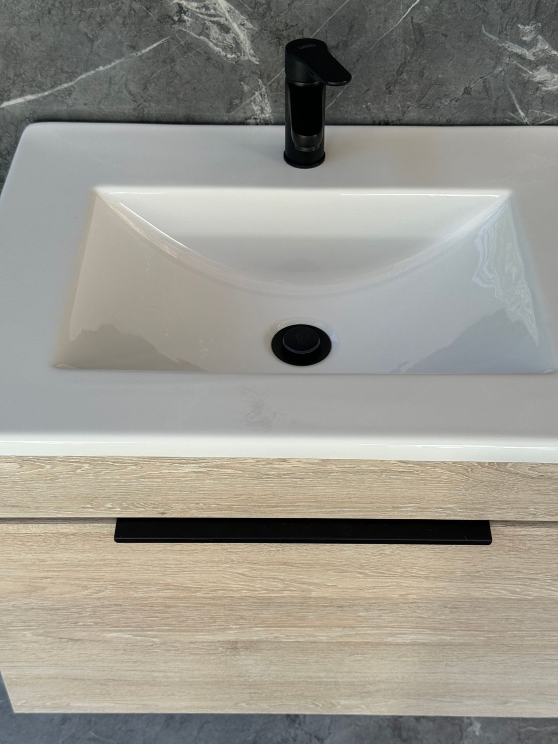 KUDO-600 Wall Mounted Cabinet &amp; Basin with black handle.