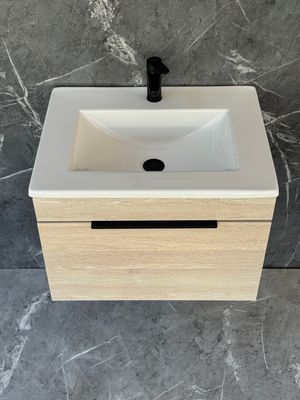 KUDO-600 Wall Mounted Cabinet &amp; Basin with black handle.