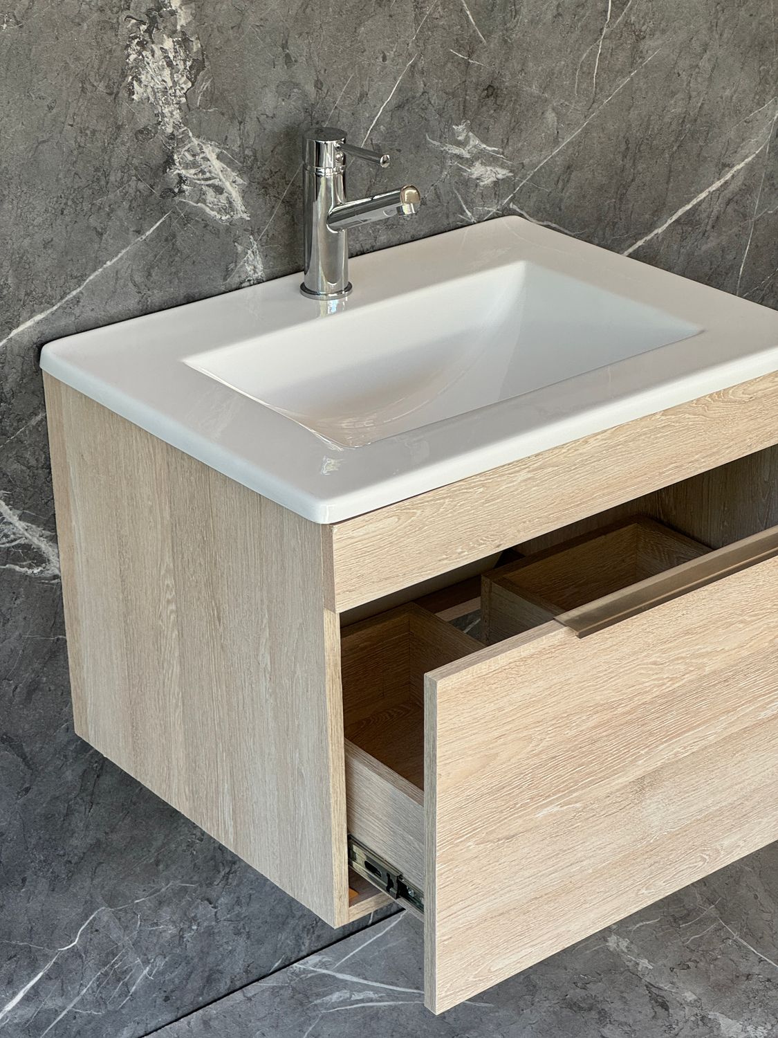 KUDO-600 Wall Mounted Cabinet &amp; Basin with silver handle.