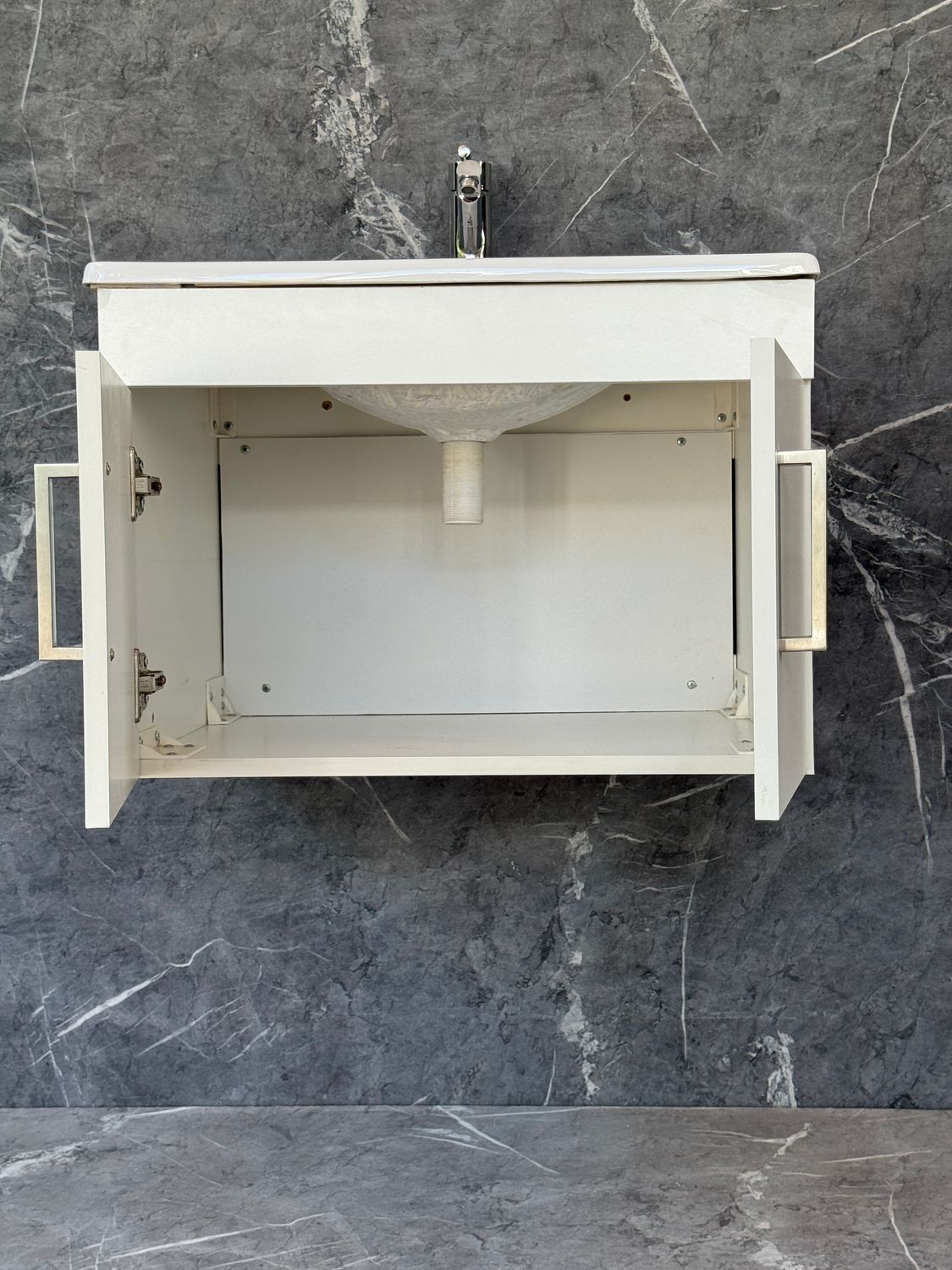 OASIS-600 Wall Mounted Cabinet &amp; Basin with silver handles.