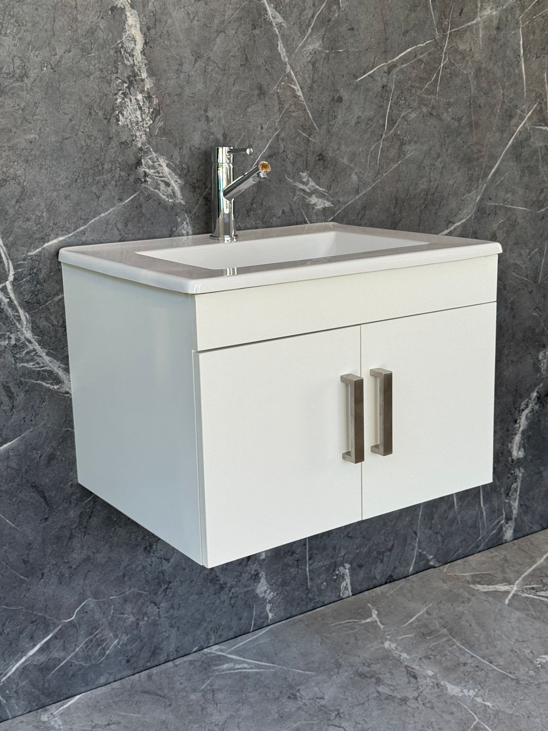 OASIS-600 Wall Mounted Cabinet &amp; Basin with silver handles.