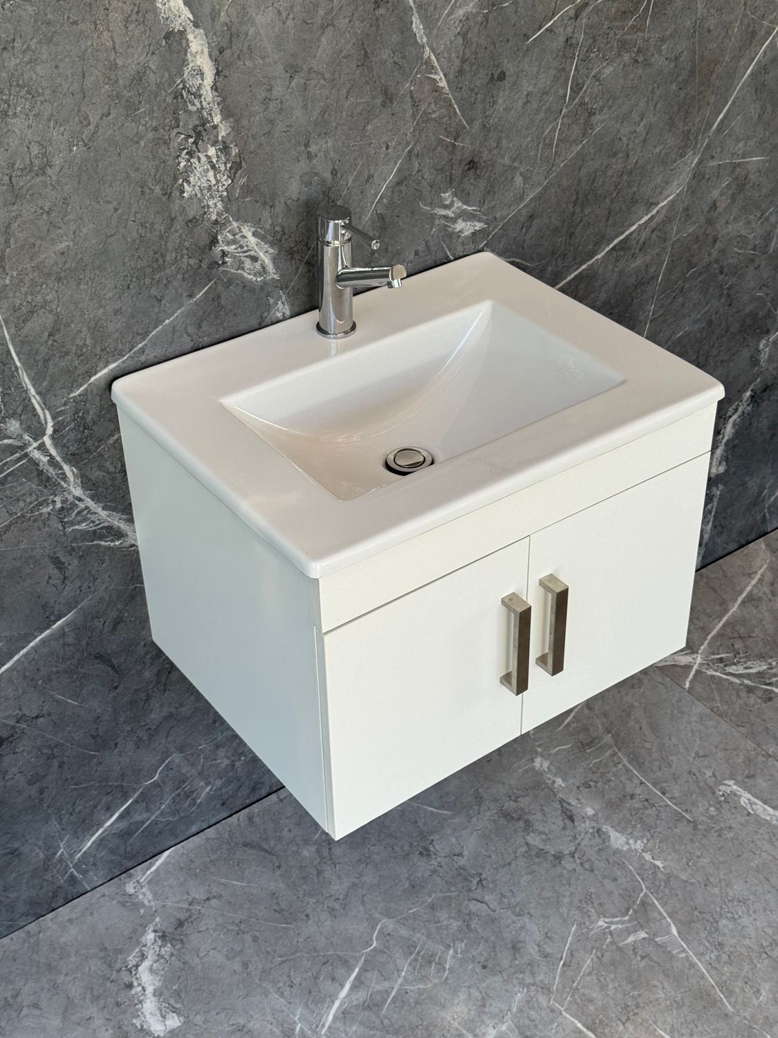 OASIS-600 Wall Mounted Cabinet &amp; Basin with silver handles.