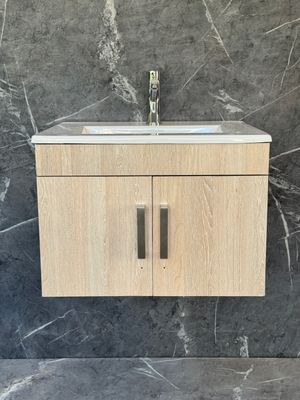 OASIS-600 Wall Mounted Cabinet &amp; Basin with silver handles.