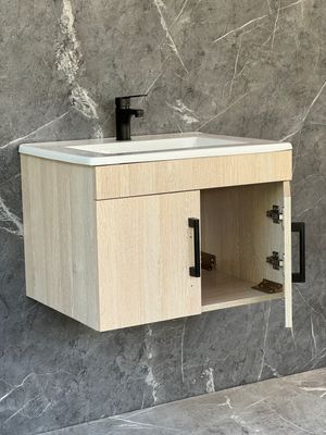 OASIS-600 Wall Mounted Cabinet &amp; Basin with black handles.