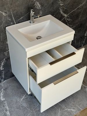 TAO-600 -PLUS Wall Mounted Cabinet &amp; Basin with silver handles.