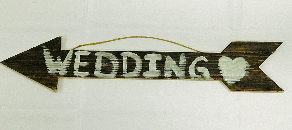 Dark Wooden Arrow Wedding Sign with White Lettering and Heart