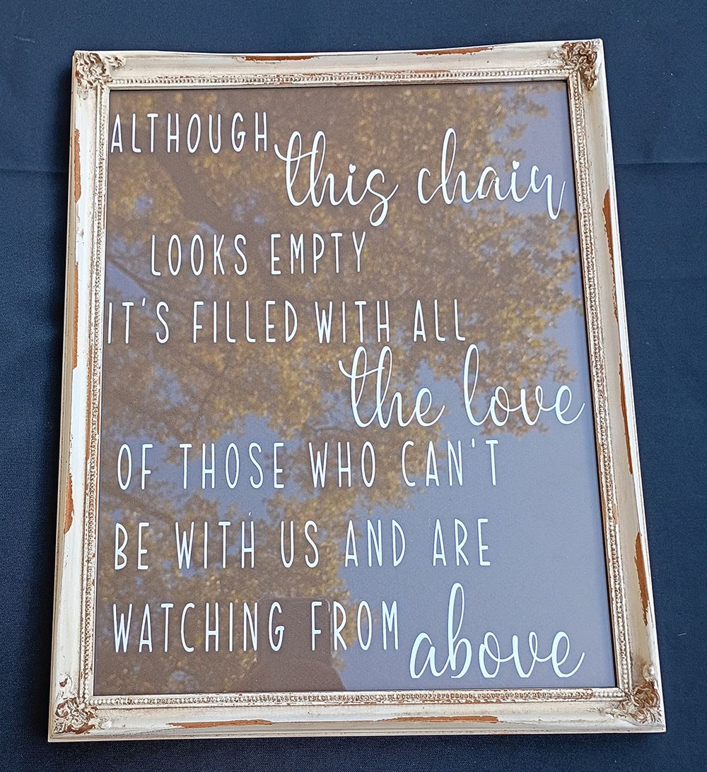 "Although this chair looks empty" sign