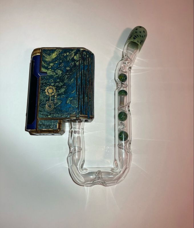 Tetra P80 U Hook With Dense Green Energy + Neptunium Dot Cooling Marbles, A Matching Mouthpiece, And A Matching Internal Mushroom Made By @EricDuyetteGlass Tetra P80 U Hook With Dense Green Energy + Neptunium Dot Cooling Marbles, A Matching Mouthpiece, And A Matching Internal Mushroom Made By @EricDuyetteGlass