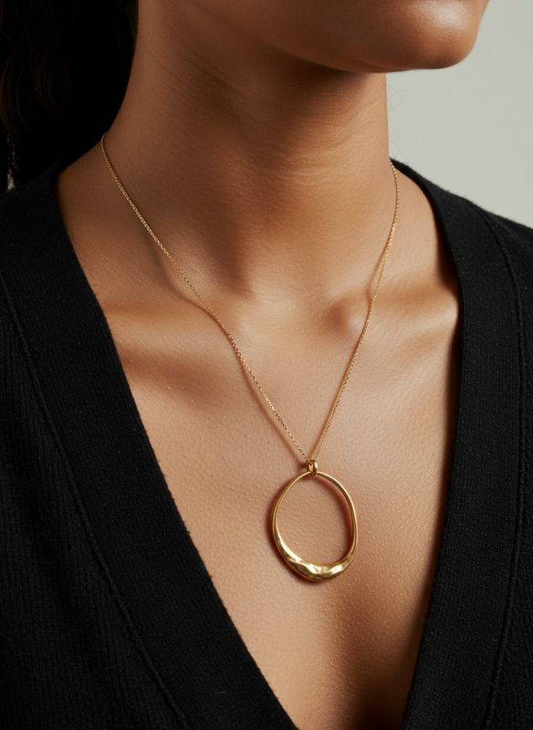 OVAL GOLD PENDANT