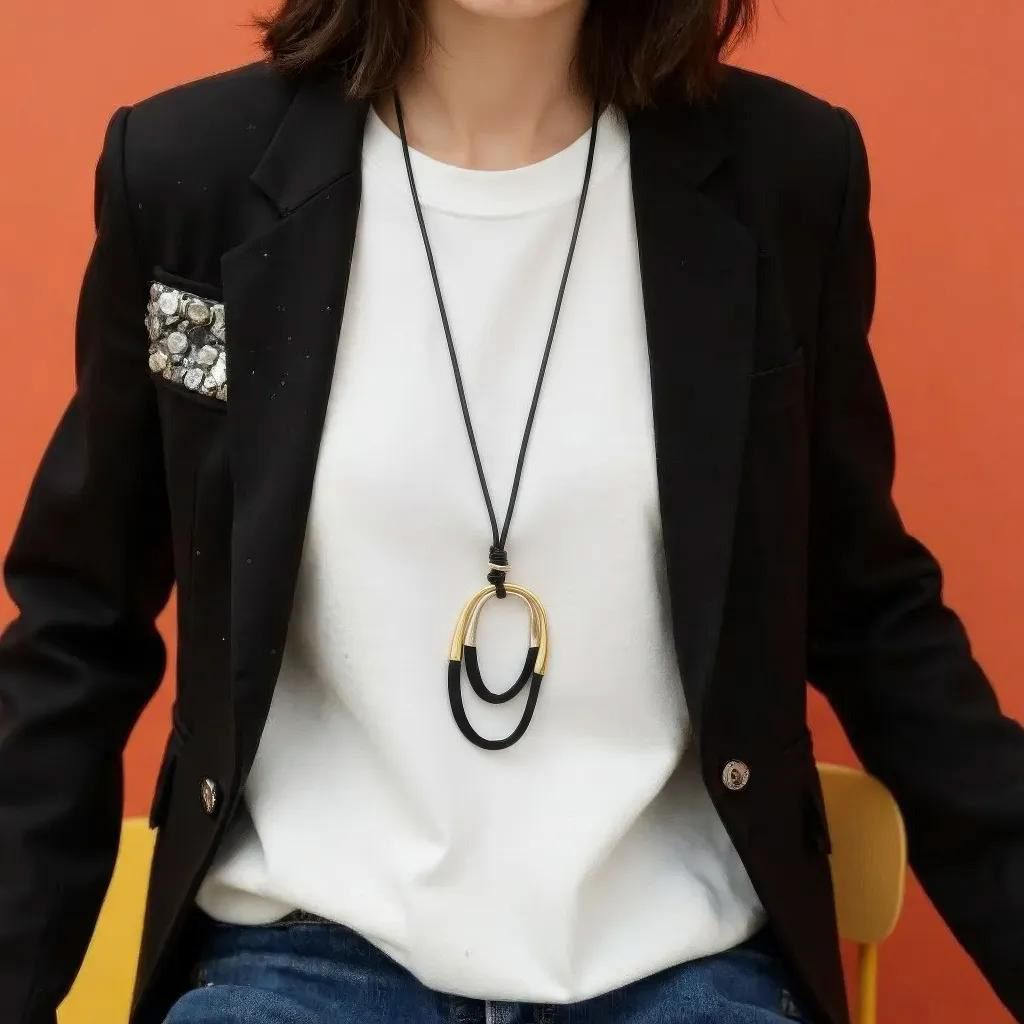 BLACK AND GOLD LEATHER PENDANT