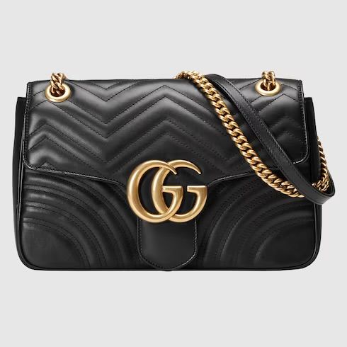 Gucci gold logo purse