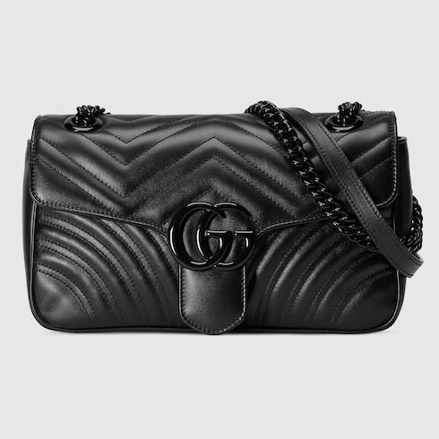 Gucci gold logo purse