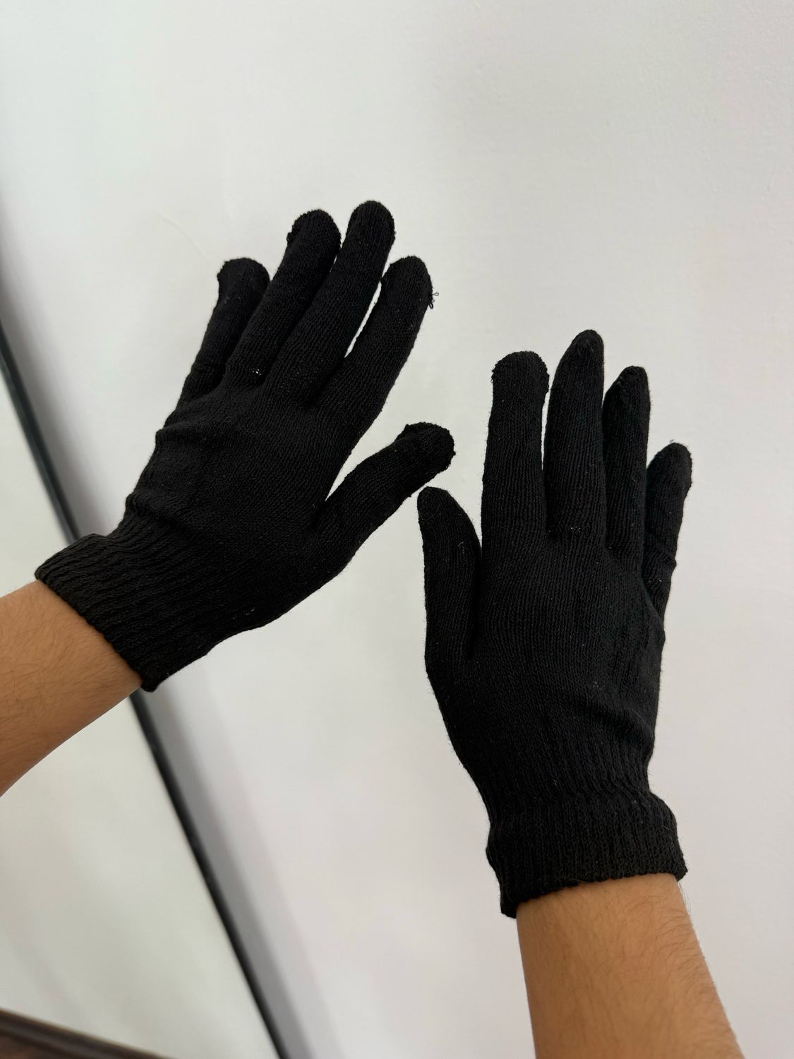 Par de guantes negros