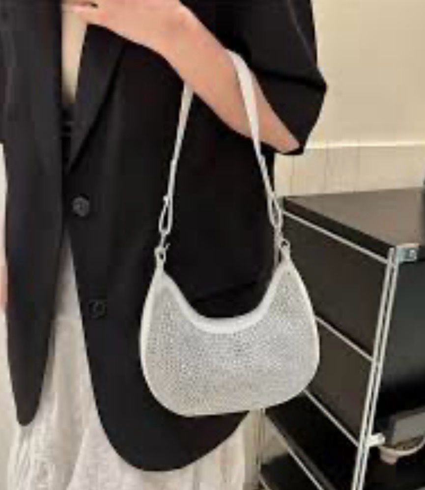 Cartera blanca con detalle en Lurex