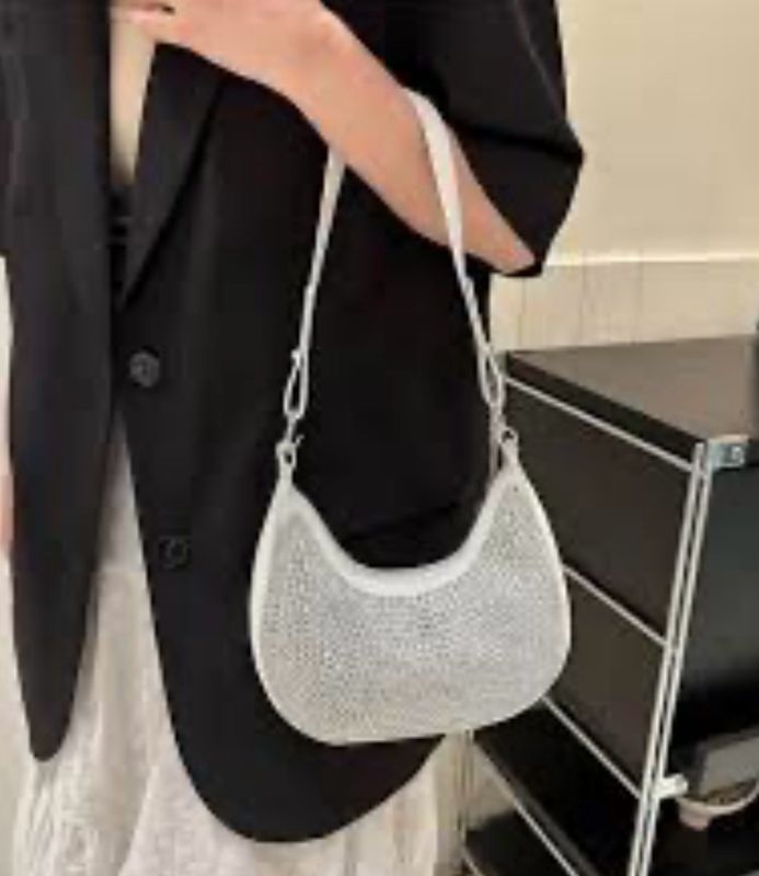 Cartera blanca con detalle en Lurex
