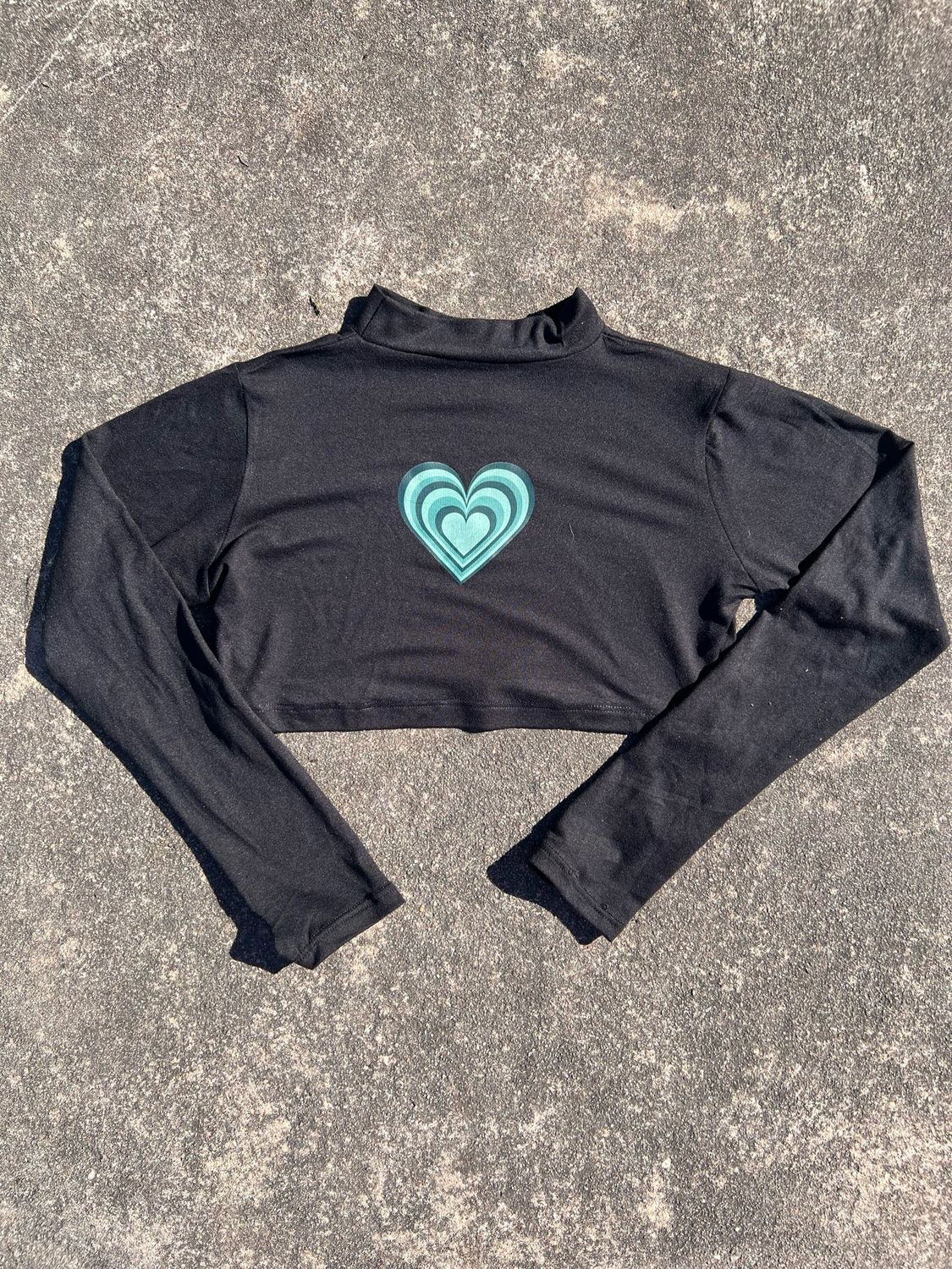 Polera de Corazon con detalle en Manga