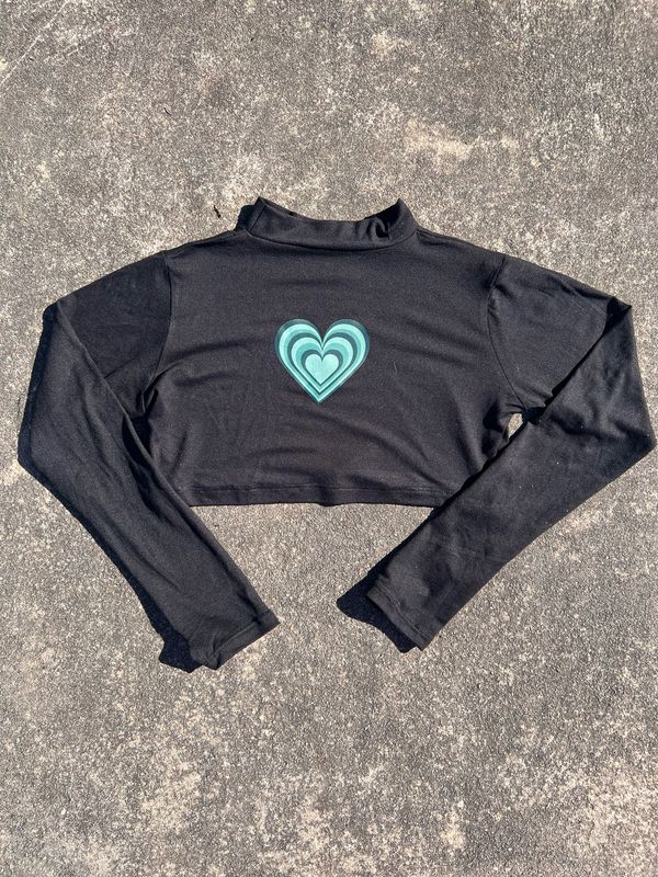 Polera de Corazon con detalle en Manga