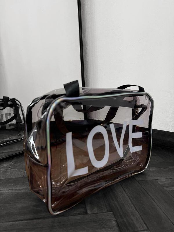Neceser LOVE tamaño grande color transparente X MAYOR ($190 c/u paquete minimo de 12 unidades)