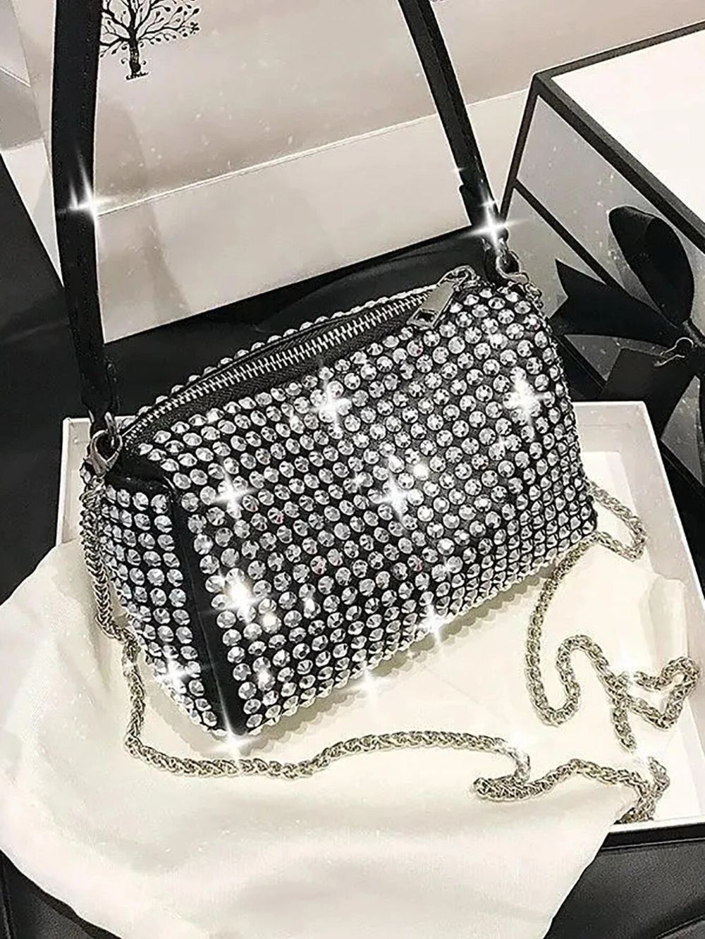 Cartera Lurex con cadena metalica y correa corta de cuero