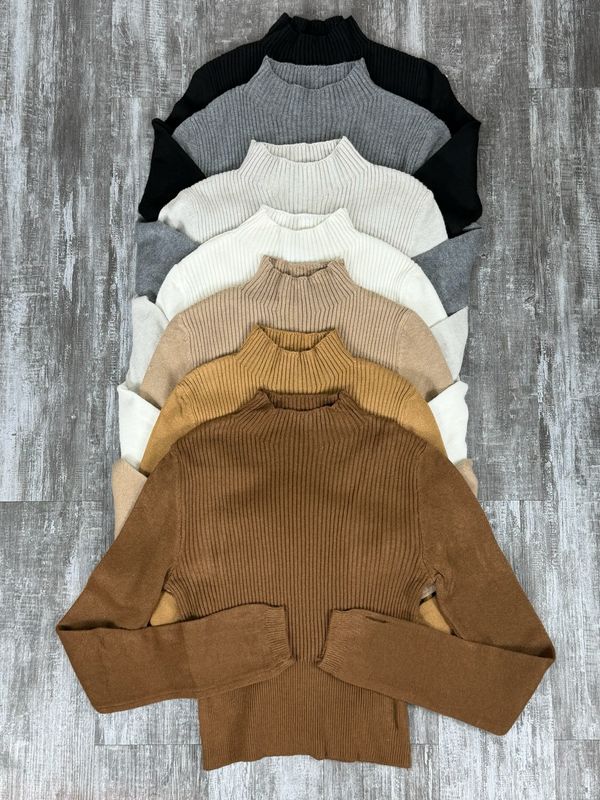 Polera con detalle en mano