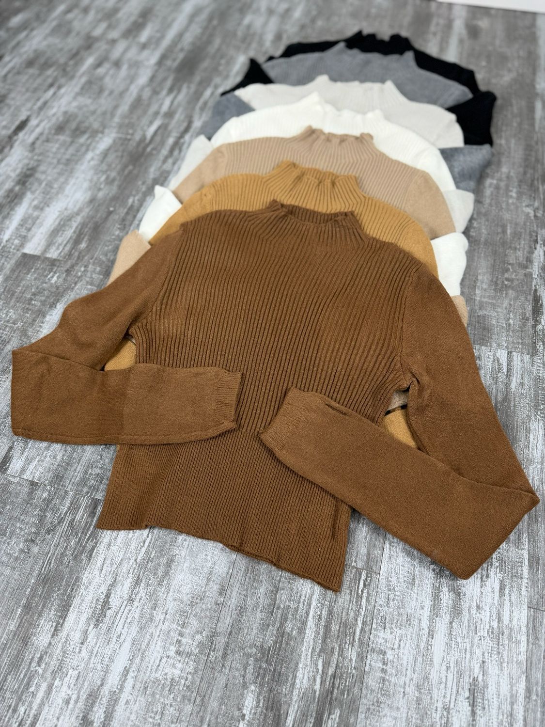 Polera de hilo con detalle en manga