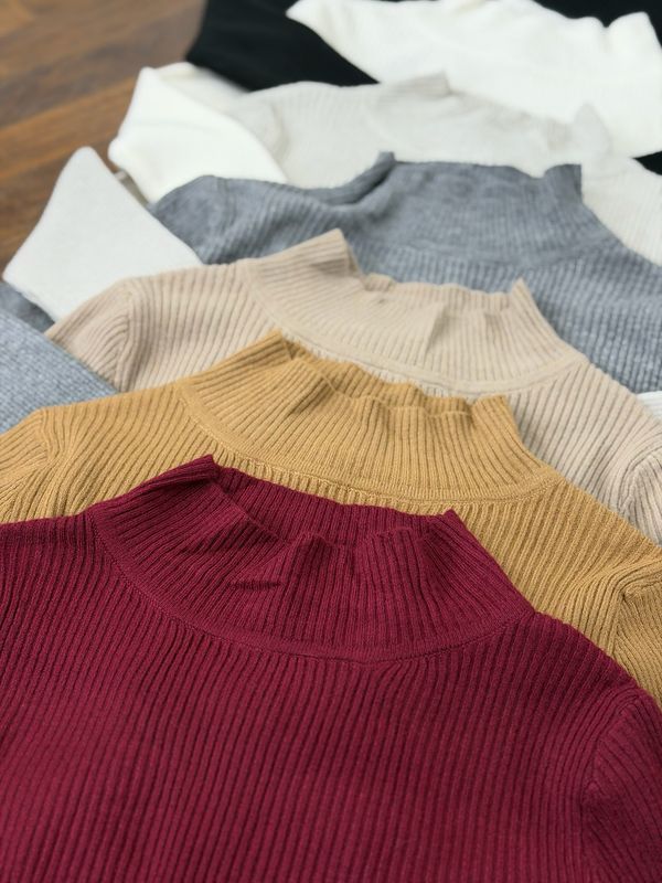 Polera de hilo con detalle en manga