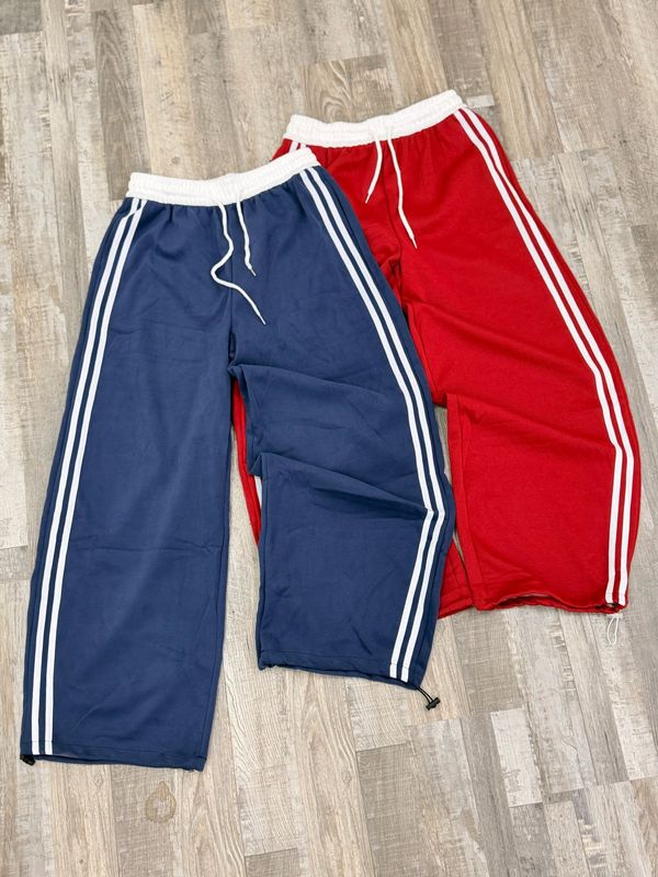 Pantalon deportivo con lineas ajustable