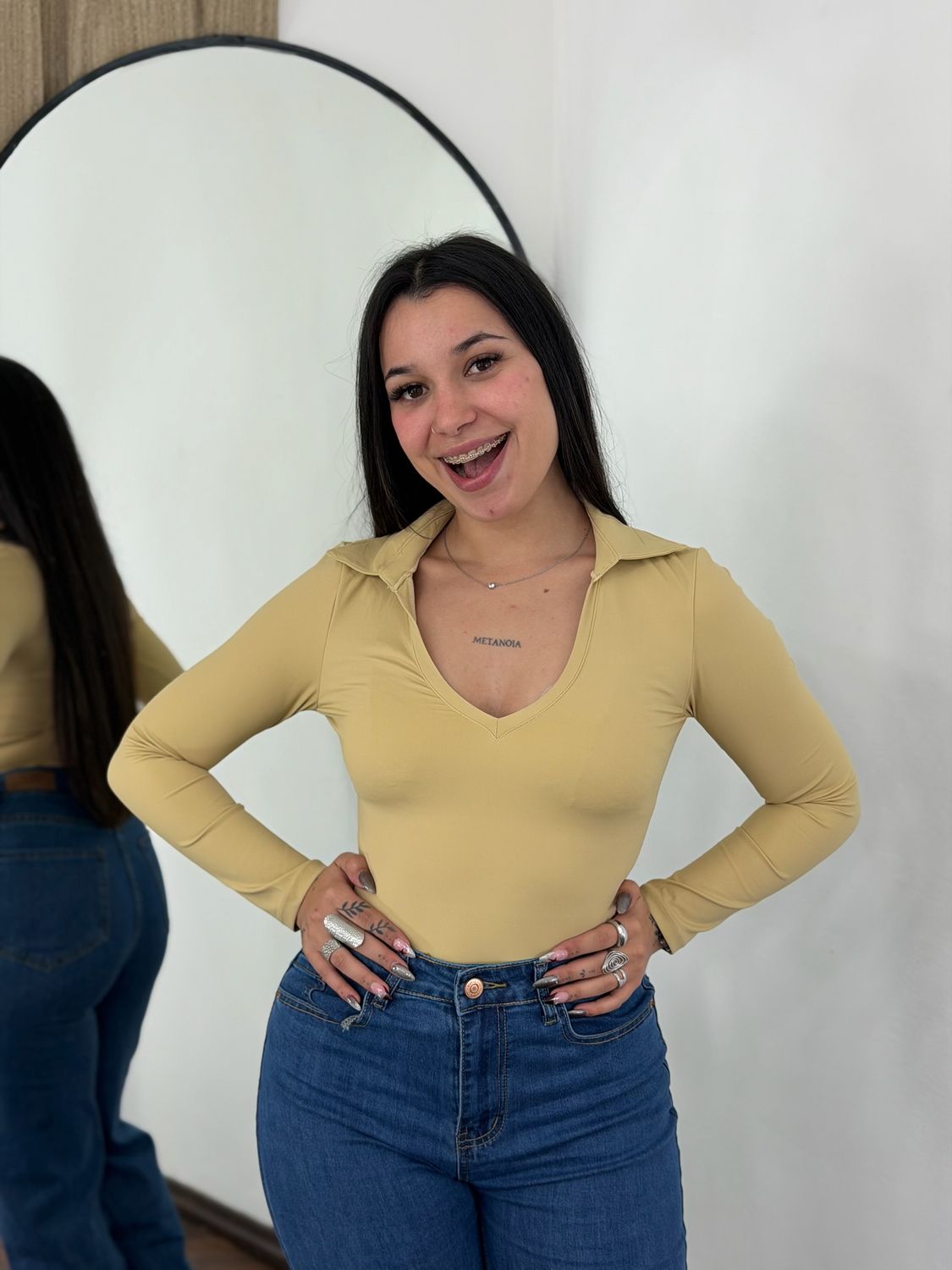 Body mangas largas con cuello
