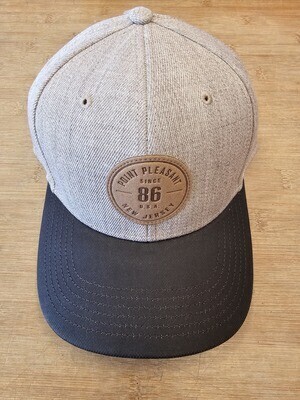 Legacy brand tan hat with a dark rim and a leather &quot;Point Pleasant, New Jersey&quot; patch - Jenkinson&#39;s Boardwalk